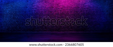 
Neon brick wall textured background. Grunge interior room with led lights. 