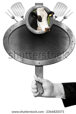 Hand of a chef or waiter with white glove holding a metal sign (empty blackboard) with a head of cow, kitchen utensils and copy space. Isolated on white background.