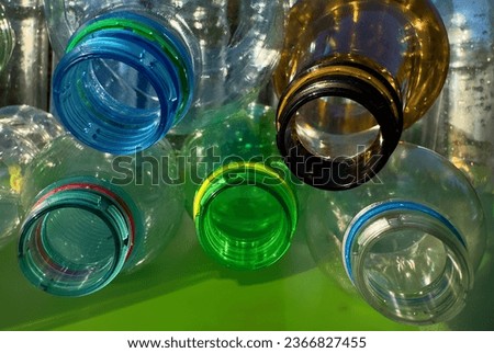 Plastic Recycling. Water bottles and plastic Bottle Caps for Recycling. Plastic recyclable and Reinventing. Bottle caps for Recycling. Lids from Plastic Bottles for Reuse. Plastics Reduce. Biopalstic