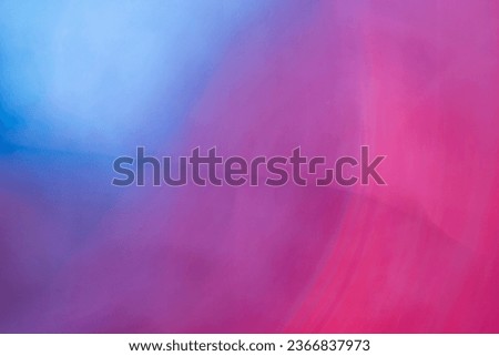 abstract blurred blue, pink and maroon mysterious background