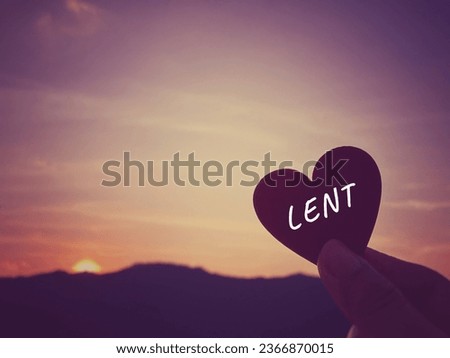 Lent Season,Holy Week and Good Friday concepts - Lent text with heart shaped in purple vintage background. Stock photo.
