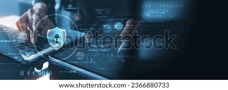 Cyber security network. Data protection concept. Businessman using laptop computer and digital tablet with padlock on network security technology with cloud computing, data management, cybersecurity Royalty-Free Stock Photo #2366880733