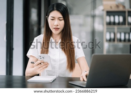 Modern woman typing and messaging with mobile phone. Women using cellphone app. Technology and computer workplace.