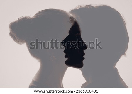 Love of couple young adult man and woman multiple exposure silhouettes