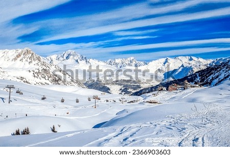 Ski resort in the snowy mountains. Snowy mountains in winter. Winter snow mountains. Ski resort in winter snow mountains