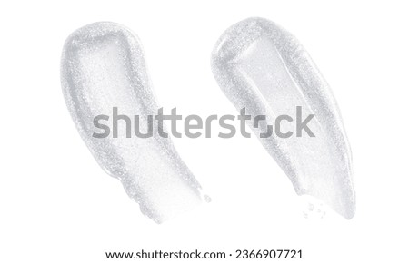 Transparent lip gloss texture isolated on white background. Clear lipstick cosmetic product smear smudge makeup swatch Royalty-Free Stock Photo #2366907721