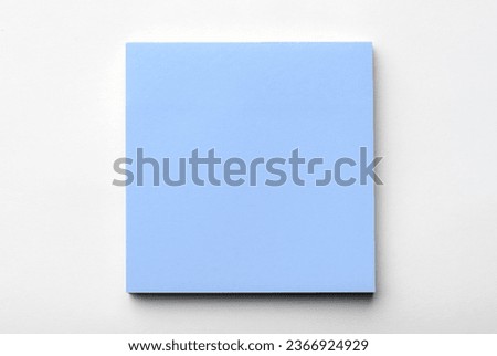 blank blue sticky notes packaging on white background. Discussing business, teamwork, brainstorming concept. sticky notes paper with shadow. copy space