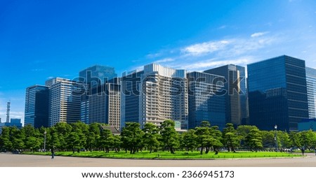 Tokyo, Japan. Office buildings in the Marunouchi business district Royalty-Free Stock Photo #2366945173