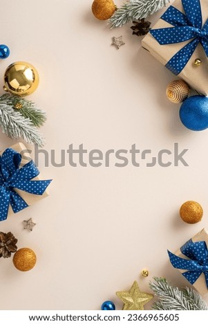 Alluring Christmas wonder: overhead vertical shot captures beauty of decorative gift boxes, dazzling baubles, pine cones, frost-dusted fir twigs on neutral background. Ideal for your seasonal messages