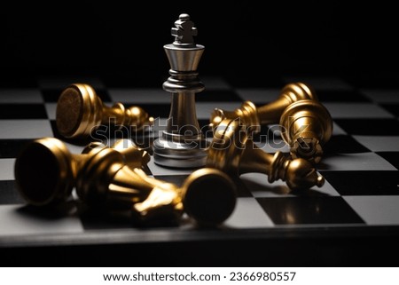 The chess king wins over his opponent. For creating business-related content Royalty-Free Stock Photo #2366980557