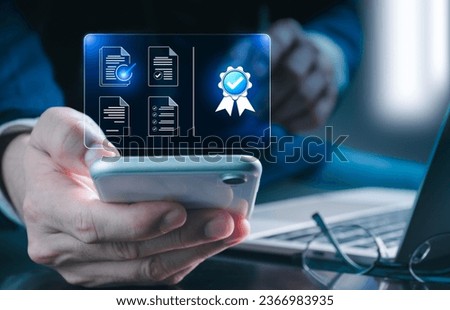 The company's product quality certificate features a checkmark to indicate that standard quality control has been carried out, and it is compliant. Businesses and companies. Royalty-Free Stock Photo #2366983935