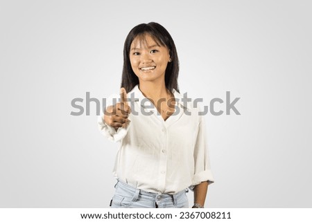 Young and Beautiful Asian College Student Girl from Nepal giving several hand gestures 
