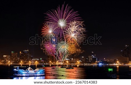 Pattaya City organizes a fireworks display on Pattaya Beach. Royalty-Free Stock Photo #2367014383