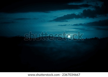 Carpathian mountains under the moon. Haloween background.