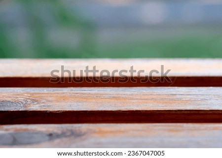 Wooden background place for text, information and green blurred area, blank for design projects, banners, website design.