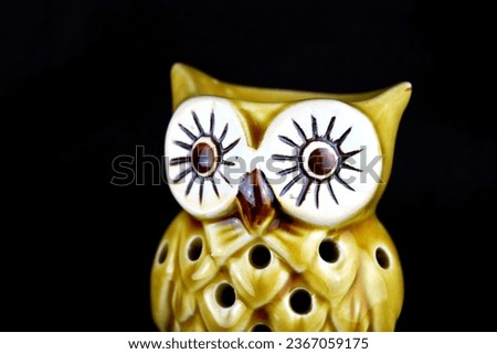close up owl head burner