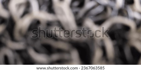 Abstract and blurred photo illustration of curly floor carpet, gray and cream colors. for backgrounds and wallpapers, digital and web design.