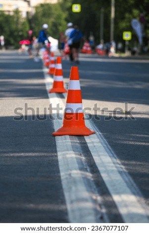 Road markings. Orange cones on the road