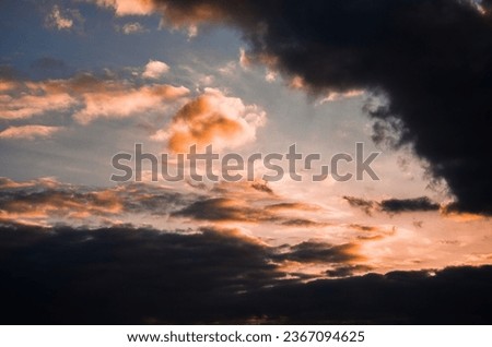 multicolored sky with illuminated clouds Royalty-Free Stock Photo #2367094625