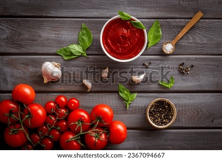 Italian tomato sauce for pasta - passata with tomatoes and basil.