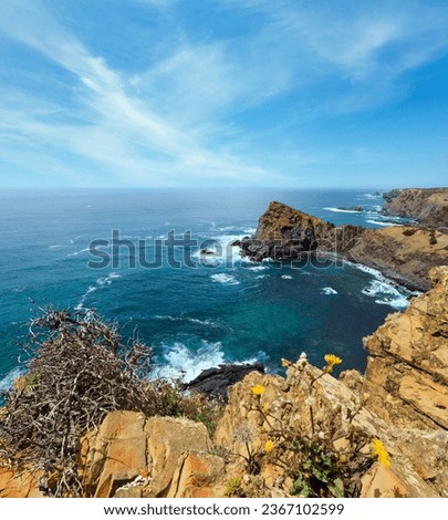 Summer Atlantic ocean rocky coastline scenery (near Arrifana Beach, Aljezur, Algarve, Portugal). Royalty-Free Stock Photo #2367102599