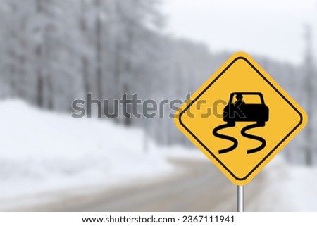 Yellow Slippery Road Sign for Caution