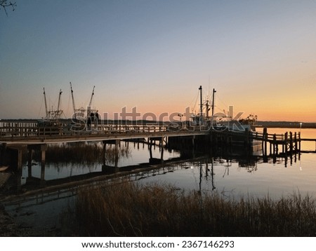 Shrimp boats in for the night Royalty-Free Stock Photo #2367146293