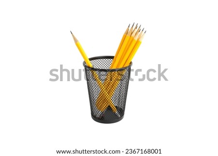 Pen holder full of pencils on isolated background                       