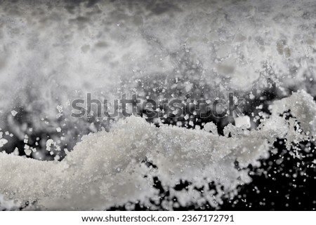 Tapioca starch flour sugar fly explosion, White powder tapioca starch sugar fall down in air. Seasoning flour powder is element material. Black background Isolated series two of images
