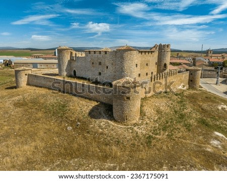 Aerial view of medieval Almenar castle near Soria Spain, four round towers protect the inner courtyard, surrounded by fortified outer walls Royalty-Free Stock Photo #2367175091