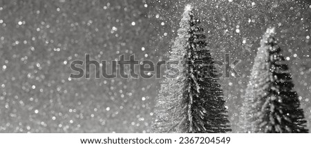Christmas tree decoration on sparkle silver bokeh background with copy space. Banner.Xmas backdrop