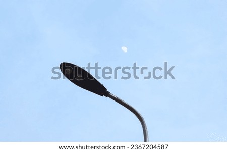 It can be seen that the moon began to appear to illuminate the sky that began to darken Royalty-Free Stock Photo #2367204587