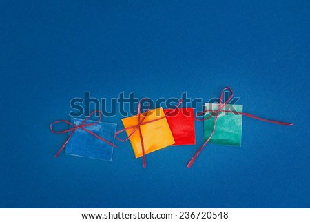 Paper gifts on blue background