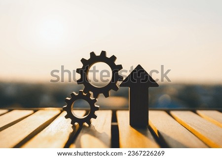 Cogwheels and up Arrows, Operational excellence, Optimize technology, innovation, production growth concept. Royalty-Free Stock Photo #2367226269