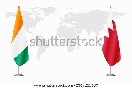 Ivory Coast and Bahrain flags for official meeting against background of world map. Royalty-Free Stock Photo #2367235639