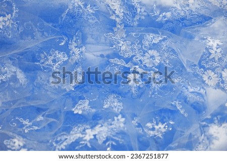 Light blue lace texture background tight design with pale blue stem. Old oil. And sapphire lines Suitable for postcards. Posters. Textures. or wallpaper Royalty-Free Stock Photo #2367251877