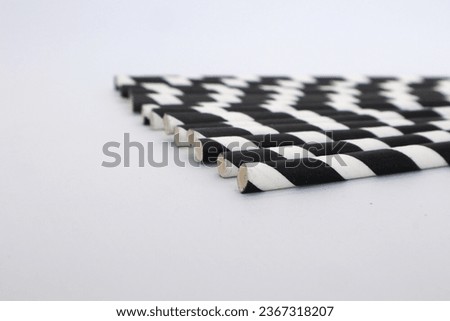Black and white patterned straw isolated on white