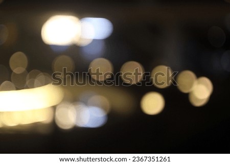 The colorful lights of motor vehicles blur and bokeh in the M Bloc area, CSW, South Jakarta, Indonesia, 22 August 2023 Royalty-Free Stock Photo #2367351261