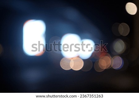 The colorful lights of motor vehicles blur and bokeh in the M Bloc area, CSW, South Jakarta, Indonesia, 22 August 2023 Royalty-Free Stock Photo #2367351263