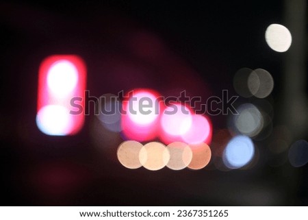The colorful lights of motor vehicles blur and bokeh in the M Bloc area, CSW, South Jakarta, Indonesia, 22 August 2023 Royalty-Free Stock Photo #2367351265