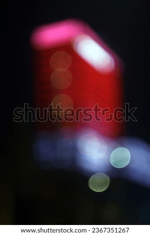 The colorful lights of motor vehicles blur and bokeh in the M Bloc area, CSW, South Jakarta, Indonesia, 22 August 2023 Royalty-Free Stock Photo #2367351267