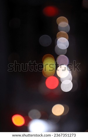 The colorful lights of motor vehicles blur and bokeh in the M Bloc area, CSW, South Jakarta, Indonesia, 22 August 2023 Royalty-Free Stock Photo #2367351273