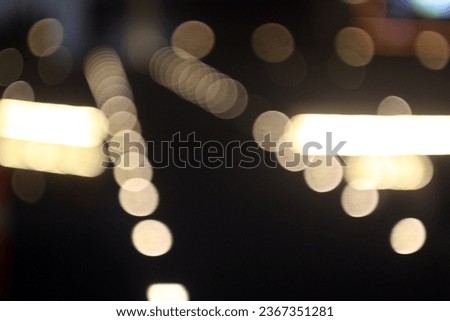 The colorful lights of motor vehicles blur and bokeh in the M Bloc area, CSW, South Jakarta, Indonesia, 22 August 2023 Royalty-Free Stock Photo #2367351281