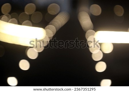 The colorful lights of motor vehicles blur and bokeh in the M Bloc area, CSW, South Jakarta, Indonesia, 22 August 2023 Royalty-Free Stock Photo #2367351295