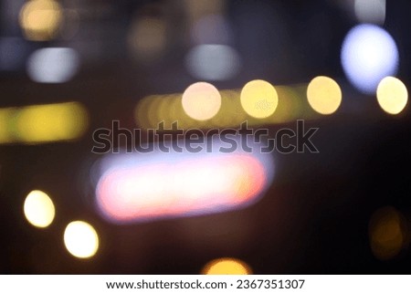 The colorful lights of motor vehicles blur and bokeh in the M Bloc area, CSW, South Jakarta, Indonesia, 22 August 2023 Royalty-Free Stock Photo #2367351307