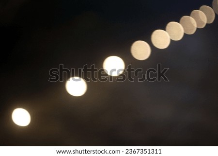 The colorful lights of motor vehicles blur and bokeh in the M Bloc area, CSW, South Jakarta, Indonesia, 22 August 2023 Royalty-Free Stock Photo #2367351311