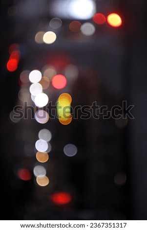The colorful lights of motor vehicles blur and bokeh in the M Bloc area, CSW, South Jakarta, Indonesia, 22 August 2023 Royalty-Free Stock Photo #2367351317