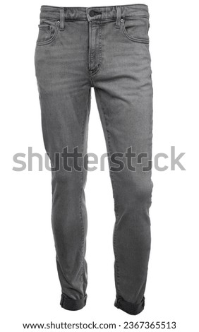 Grey slim-fit jeans of classic design on a mannequin isolated on a white background. Straight cut with natural fading effect Royalty-Free Stock Photo #2367365513