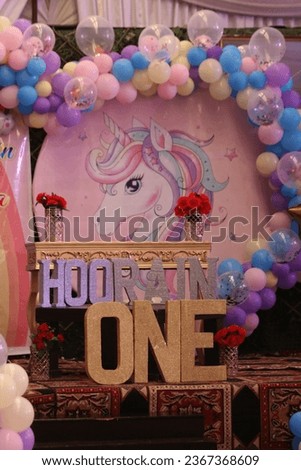 Party hall decorated with big balloons, Birthday Cake on a background balloons party decor, Birthday decorations, Baby's first year photoshoot.
