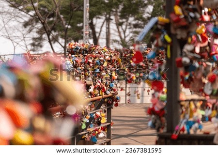 The love locks on the bridges leading to the heart of Seoul: the N Seoul Tower Royalty-Free Stock Photo #2367381595